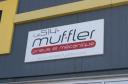 Le 514•MUFFLER (Pneu Select) logo