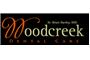 Woodcreek Dental Care logo