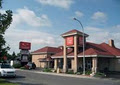 Econo Lodge Inn & Suites logo