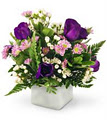 KW Flowers & Gifts By The Basket logo
