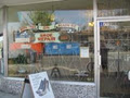 Both Feet on Main Street Shoe Repair logo