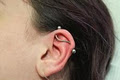 Golden Horseshoe Tattoo & Piercing image 5