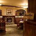Mantles Restaurant | Lounge logo