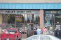 Melly's Bakery & Cafe logo