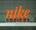 NikeStore Toronto 416.921.NIKE(6453) logo