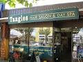Tangles Hair Salon & Day Spa logo