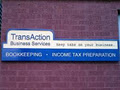 TransAction Business Services logo