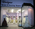 Unique Bridal & Evening Gowns logo
