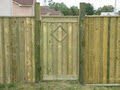 DECKS & FENCES By Design logo