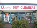 Quality Dry Cleaners logo