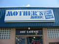 Mother's Music/The Drum Shop logo