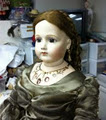 Porcelain Beauties Doll Emporium & Studio logo