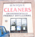 Unique Cleaners logo