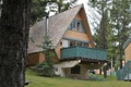 Cabins at Douglas Fir Resort and Chalets logo