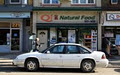 Qi Natural foods logo