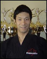 Clint Cora Karate World Champion Diversity Motivational Speaker logo
