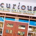 Curious Hair Skin & Body - Aspen Landing logo